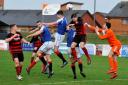 Neil Slooves heads Irvine Meadow to victory.