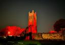 Kilwinning Abbey lit up red for Remembrance weekend