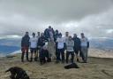 Thomas and his friends after scaling Ben Lomond in the first of their fundraising efforts.