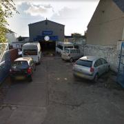 Red light for garage plans as extension bid refused