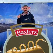 Andy Darling with his medal after completing the Loch Ness Marathon.