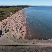 Irvine beach during a busy summer day this year.