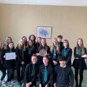 The Chamber String Ensemble proudly show their Chamber Music Trophy