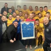 Following his final match, Rab McNaughton was presented with his jersey signed by the squad and committee.