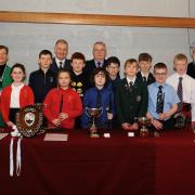 Some of the winners with their trophies