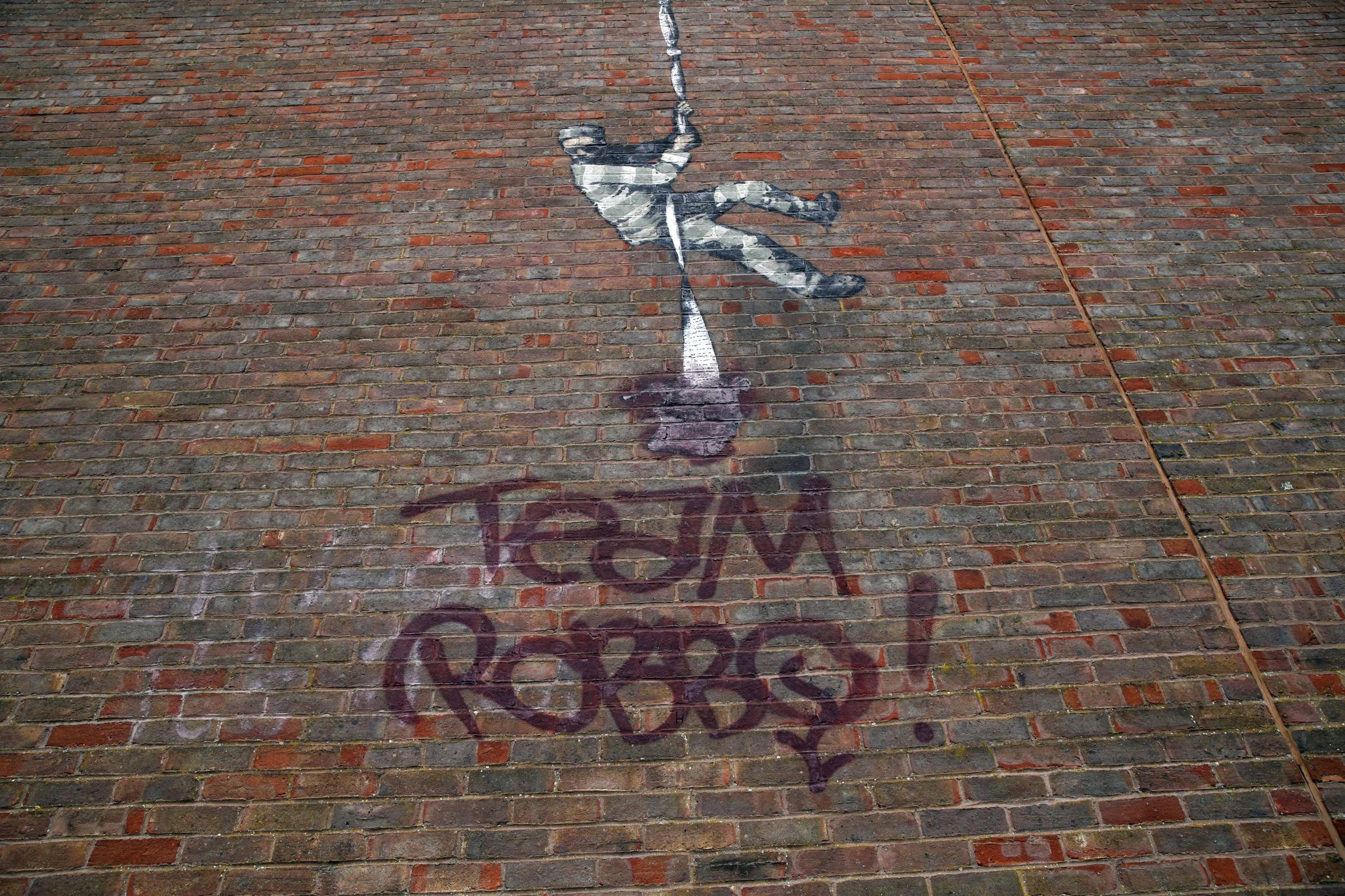 'Huge disappointment' after Banksy artwork on Reading Prison defaced - Vimarsana News