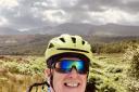 Rev Neil Urquhart cycling on Arran