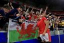 Wales’ Dafydd Jenkins poses with fans (Bradley Collyer/PA)