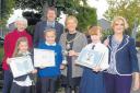 Castlepark Primary youngsters receive the Provost Cup, from then Provost Joan Sturgeon