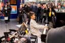 Crowds gather at Manchester Piccadilly to hear Ethan 9, on The Piano