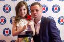 Ellie and proud dad Robert with her award