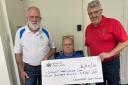 Kind golfers present £800 cheque to help out cancer charity