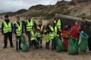 Mass amounts of waste removed from Irvine's beach