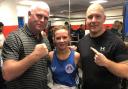 Irvine Vineburgh Boxer Brooke Nealy (pictured centre) with coach Alec Mullen (left)
