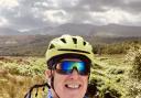 Rev Neil Urquhart cycling on Arran