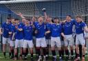 Irvine Meadow 2006 celebrate their league cup win.