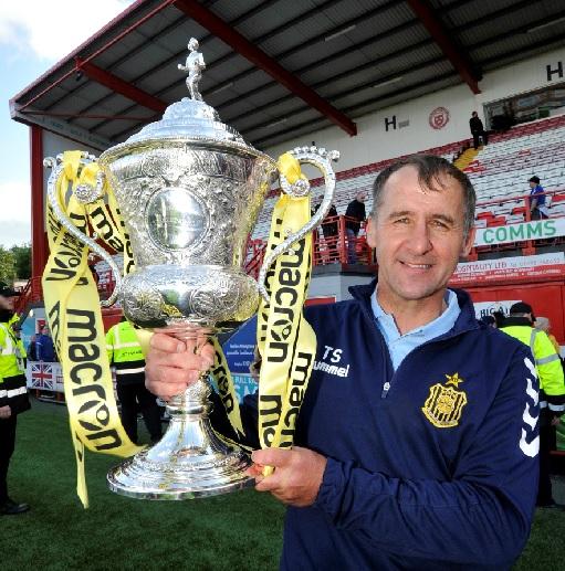 Auchinleck Talbot manager Tommy Sloan celebrates with the Scottish Junior Cup in 2019.