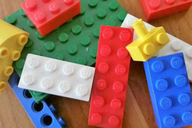 Irvine Times: Multi-coloured LEGO blocks. Credit: Canva