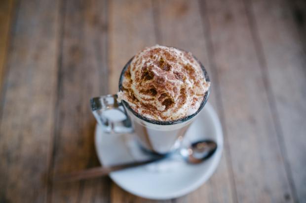 Irvine Times: A hot chocolate topped with cream and sprinkles (Canva)