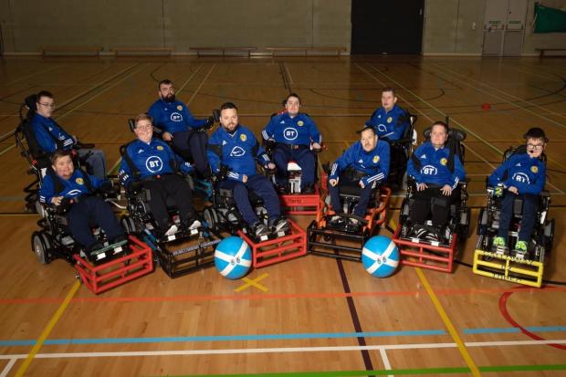 Irvine powerchair footballer James Doull with his team-mates before the tournament in Northern Ireland