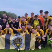 Lawthorn AFC celebrate with the Thistle Steel Cup.