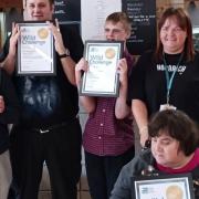 The Trindlemoss team show off their awards