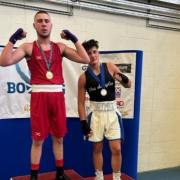 Irvine Elite Boxing Club's Jamie Bingham, left, won gold