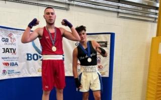 Irvine Elite Boxing Club's Jamie Bingham, left, won gold